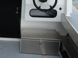 Storage box below aft helm (aluminum) for diesel tank.